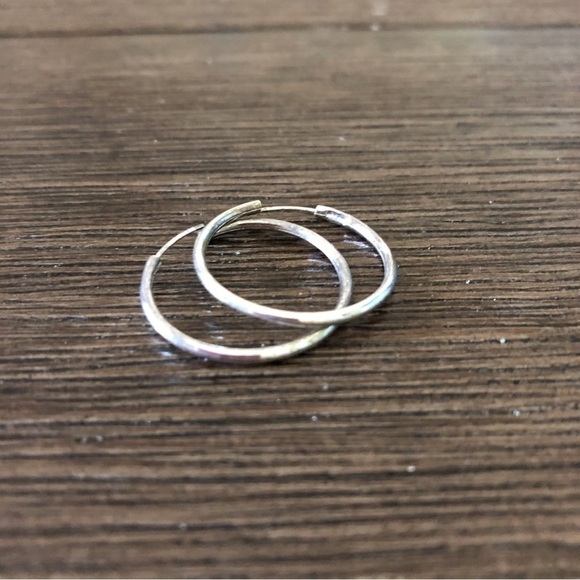 Streling Sliver Medium hoop earrings. - Picture 2 of 2